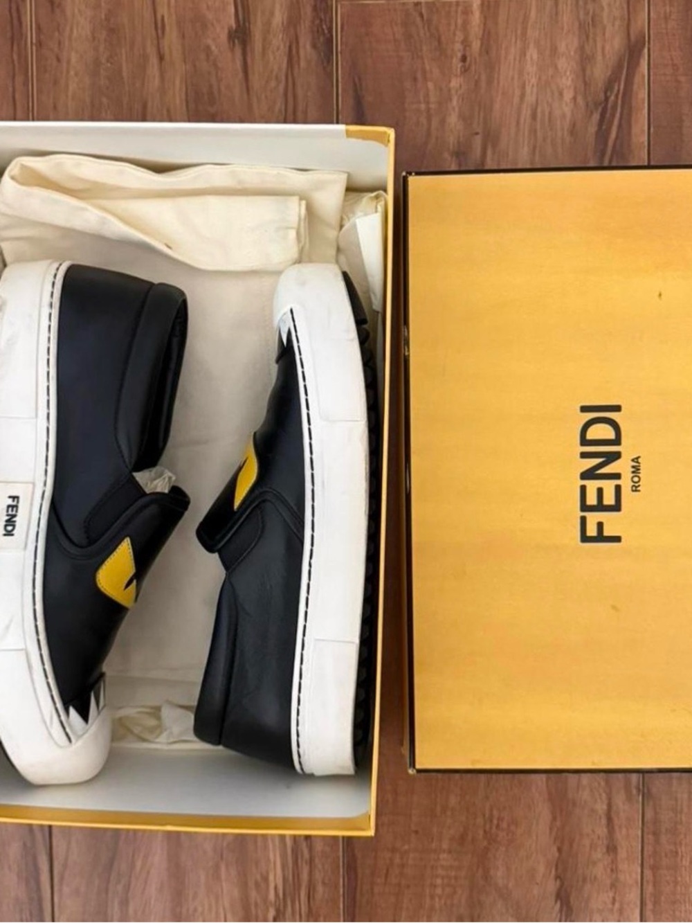 Fendi Monster Black Leather Slip-On Sneakers with Yellow Logo